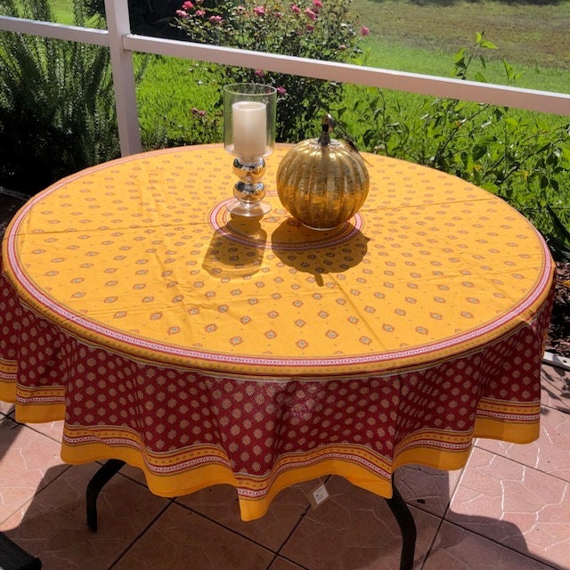 Round 70" coated or cotton Provence tablecloth yellow with red